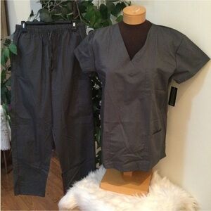 Just Love Woman’s Large scrubs set top and pants are in steel gray NWT